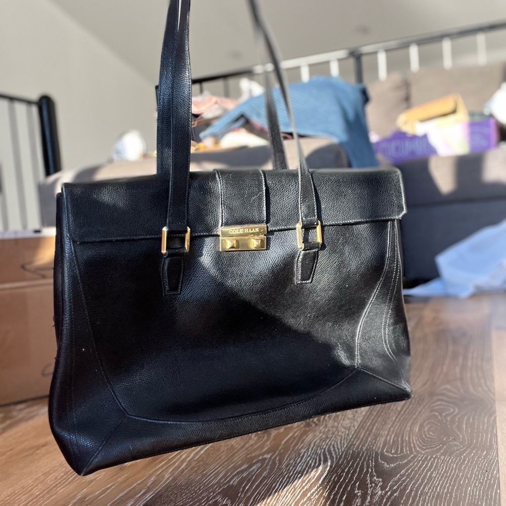 Cole Haan Black Tote with Structured Design and Gold Clasp